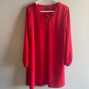 Red dress perfect for business or that special event.